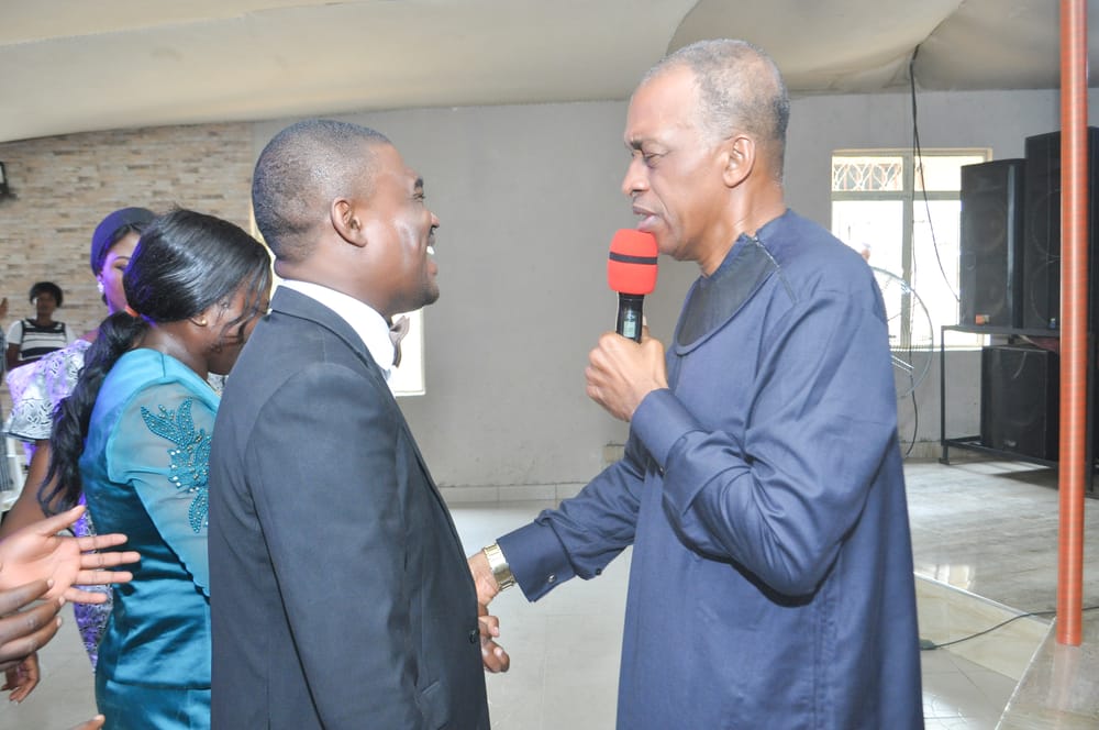 Ministers praying together