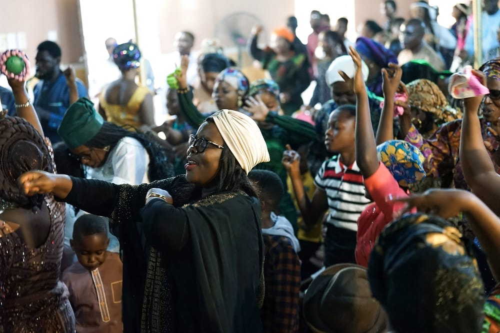 The congregation worshipping at a church program